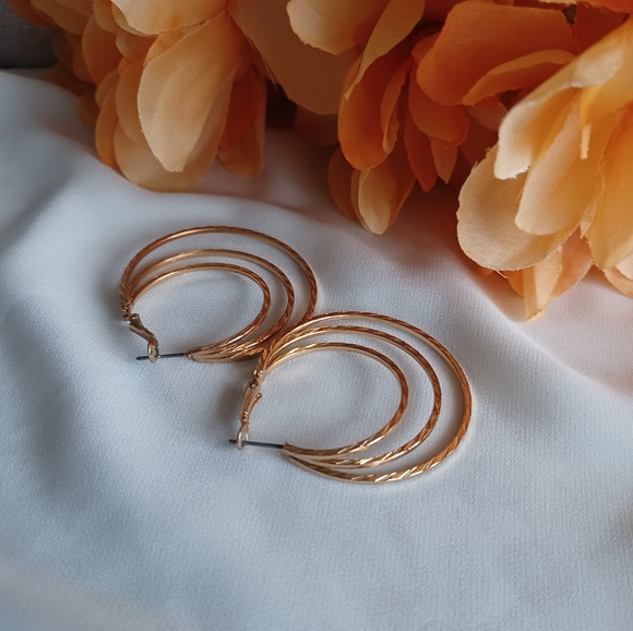 Golden Spiral Hoop Earrings - Picture 10 of 15